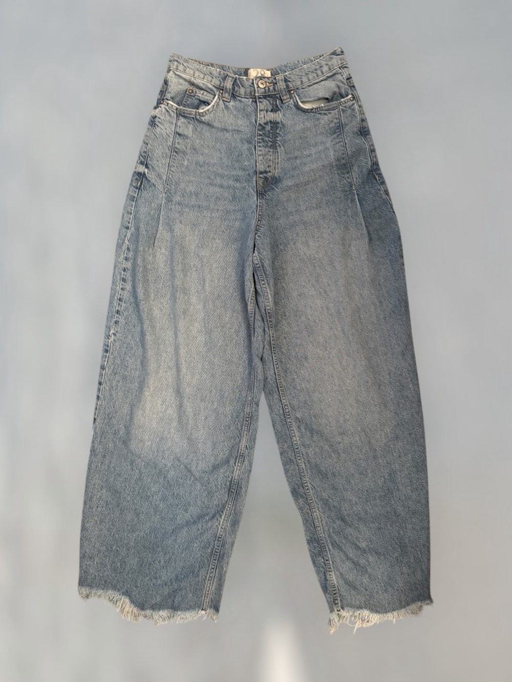 Free People Barrel Jeans 
Frayed bottom